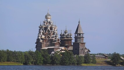 Wall Mural - Kizhi Island and Kizhi Pogost wooden church open-air museum, summer vibrant view of Onega Lake, Medvezhyegorsky District, Republic of Karelia, Russia