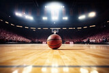 Fototapeta Fototapety sport - Orange ball on basketball court with stadium as background. Basketball game championship
