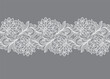 Seamless floral background with white lace leaves and flowers.Vector white lace branches with flowers