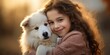 © Teppi - A cute little girl cuddles with a white dog outside, embracing