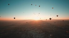 Hot Air Balloons Flight The Early Morning. Cappadocia Is One Of The Most Well Known Tourist Destination. You Can Visit The Fairy Chimneys And Ride A Hot Air Balloon During The Sunrise.