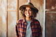 Portrait of smiling hipster woman with hat and plaid shirt