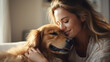 happy woman snuggling and hugging golden retriever dog, close friendship spending time at home