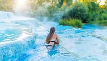 Woman Enjoys Spa In Geothermal Hot Spring- Saturnia In Italy