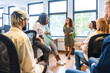 © unai - Members of a coworking in a meeting