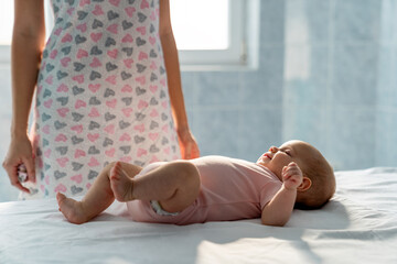 Wall Mural - Mother with baby keeps a distance because of postpartum depression. Mental disorder, tiredness