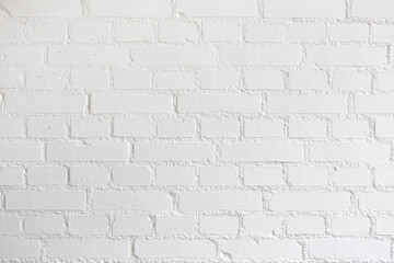 Photograph of a white painted brick wall. perfect for entering text and images