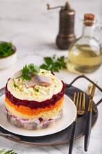 Dressed Herring Fish Layered Salad With Boiled Eggs And Vegetables: Potato, Carrot And Beetroot. Herring Under A Fur Coat.