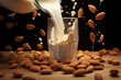 The process of pouring almond milk into a glass with almonds on the table.