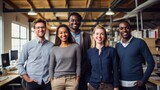 Fototapeta Most - Diverse creative team looking happy. Diverse working culture group of persons is in their startup office wearing informal clothes people are smiling most persons are standing.