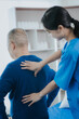 © Witoon - Asian female doctor or nurse exercising with elderly man at hospital
