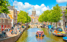 Amsterdam City Centre And Water Canal In De Wallen District, Netherlands