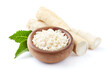 Horseradish with grated root in closeup on white background