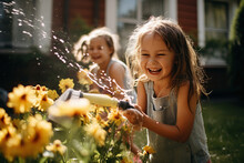 Family Fun, Two Girls Splashing In The Garden Water