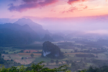 Poster - Beautiful landscape sunrise of mountain with mist at Phu Langka National Park. Sunrise and The Mist with Mountain Background, Phayao Province, thailand.Foggy mountain landscape under morning sky