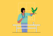 Veterinarian Holding Bird Above Vet Table In Veterinary Hospital Care Facility, Clinic, Check-Up, Visit