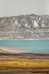 Wall Mural - Stunning landscape in the Ali region of Tibet, with majestic mountains and a tranquil blue lake