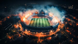 Fototapeta Sport - Aerial view of the football stadium at night. Smoke coming from football fans' torches.