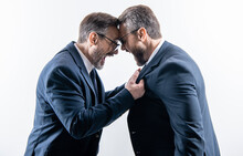 two businessmen fighting at rivalry isolated on white. unethical practice. businessmen having conflict fight in business. fighting between boss and employee. business fight