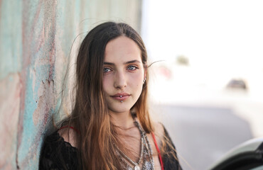 portrait of young woman with piercing