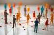 Networking representado  por pequeñas figuras con forma humana
