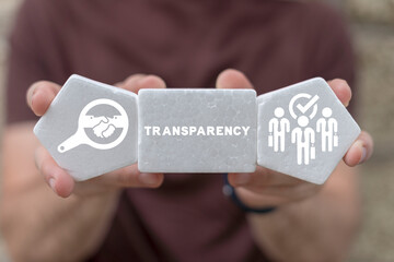 Wall Mural - man holding white styrofoam blocks sees word: transparency. concept of business transparency. honest