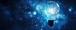 Artificial intelligence data digital innovation, abstract blue glow light bulb on dark blue background