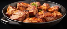 Cooking Red Meat In A Pan Involves Frying Juicy Pork That Has Been Cut Into Pieces Using Butter