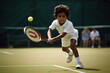 indian little boy playing tennis