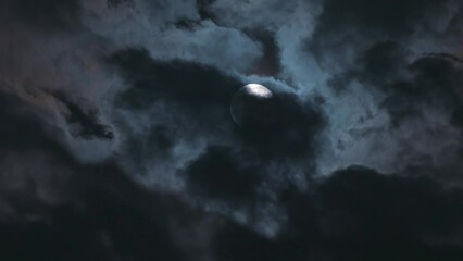Wall Mural - changes of cloud cover on the background of full moon. time lapse of an atmospheric, mystical full m