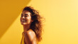 Side view portrait of happy Caucasian young woman on yellow banner with copy space