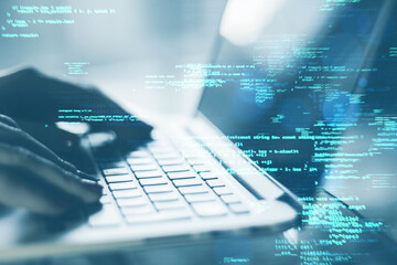 Close up of female hands using laptop keyboard on desk with creative coding html language on blurry background. Web developer and programming concept. Double exposure.