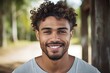 Portrait of smiling african american man with curly hair in park, Mixed race man smiling, AI Generated