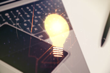 Poster - Creative idea concept with light bulb illustration on modern laptop background. Multiexposure