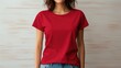© mariiaplo - Frontal view of red T-shirt mock-up with a blank canvas for your design