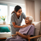 Fototapeta  - young indian nurse supporting elderly patient