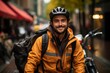 © Hunman - Delivery man european in yellow sweat shot and bike helmet in city street.