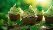 Set of St. Patrick's Day Shamrock Leaves Cupcakes on Green Bokeh Background ,closeup