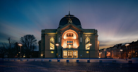 Wall Mural - historical theater building in a night city in Europe