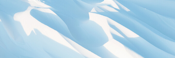 Wall Mural - snow texture. wind sculpted patterns on snow surface. wind in the tundra and in the mountains on the