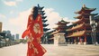 Asian woman in Chinese dress traditional walking at Kaohsiung's famous tourist attractions