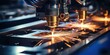 © sirisakboakaew - CNC Macro Laser Machine Spark Cutting Metal Sheets Industrial Signage Blue Steel Plasma Technology