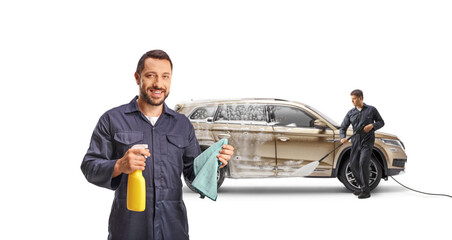 Canvas Print - Car wash concept, worker holding a cloth and man washing a vehicle