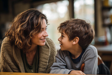 affectionate moment between smiling mother and son at home, showcasing a warm, loving family dynamic