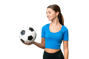 Poster - Teenager caucasian girl playing football over isolated background with happy expression