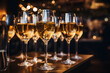 © Darya - Gasses with wine on a bar counter. Wineglasses on a party. Holiday celebration in a bar or restaurant