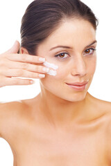 Poster - Portrait, hand and cream with a beauty woman in studio isolated on a white background for natural wellness. Face, skincare and facial lotion or cosmetics with a confident young model looking perfect