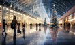 © Eli Berr - Blurry photo of airport terminal with christmas decorations and tree, people with motion, travelers reuniting with loved ones for the holidays, luggage piled high, and a giant Christmas tree.