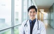 © COC STUDIO - Portrait of young adult male doctor inside a hospital feeling proud and confidence.