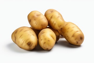 Aufkleber - A pile of potatoes neatly arranged on a white surface. This image can be used to depict farm produce, food ingredients, or cooking preparations